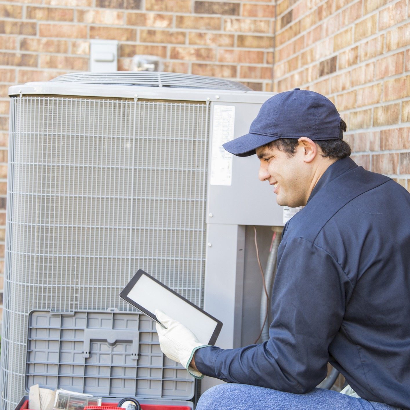 Man checking AC system